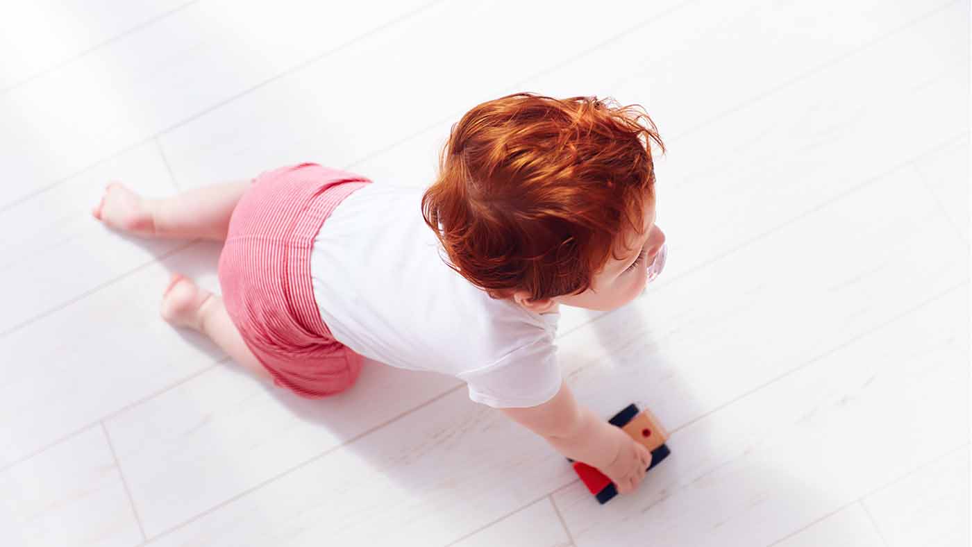 Home-made slide – practising positioning toys with your toddler - Featured Image