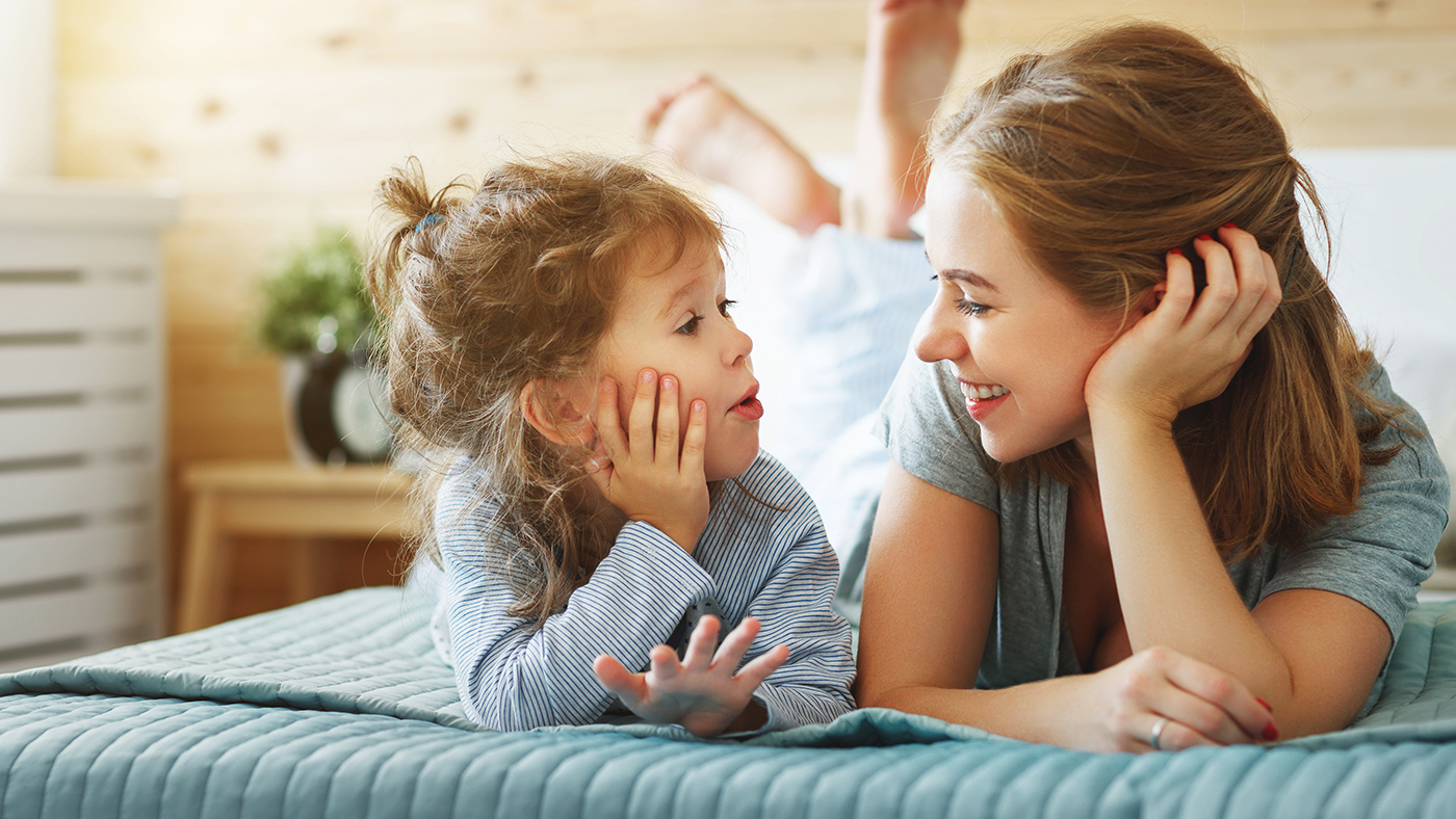 Early reminiscing with your child may help them share feelings in the future - Featured Image