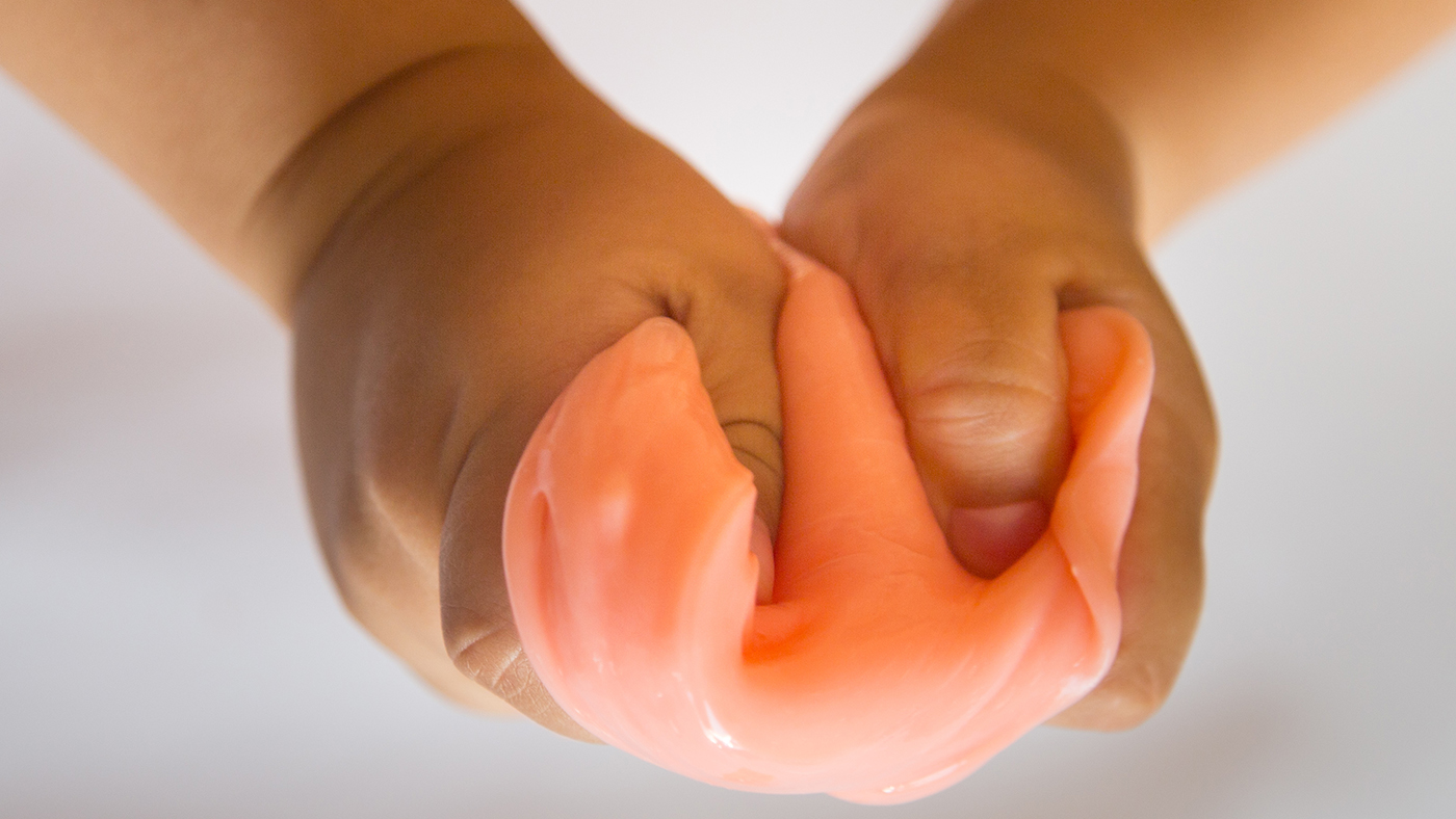 Squeeze a sock – making a simple fine motor toy for your baby - Featured Image