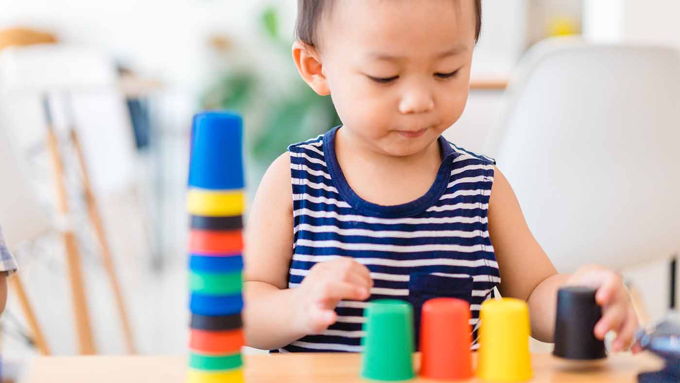 What is inside that cup? Using cups to practise holding and tipping - Featured Image