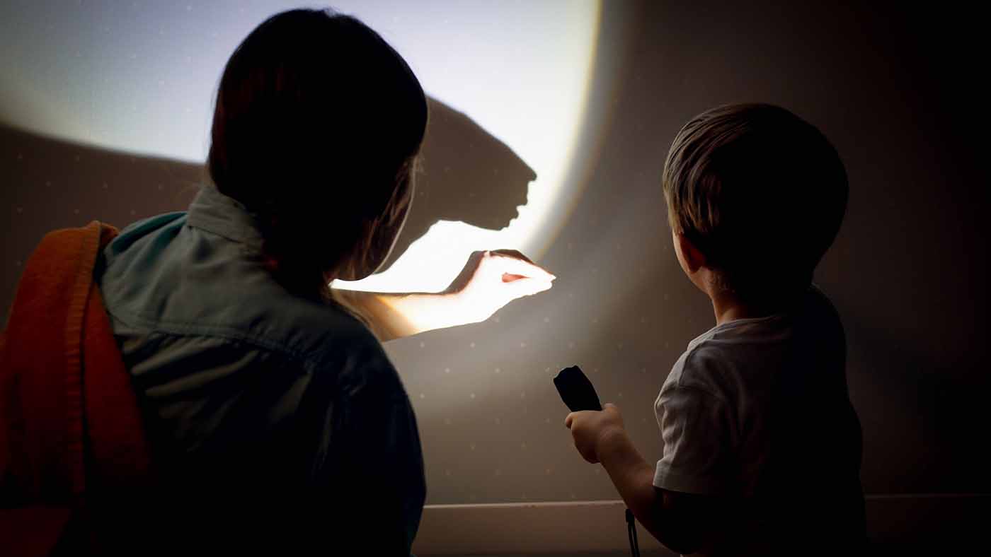 Shadow play - encourage your toddler to make different shapes with their hands and fingers - Featured Image