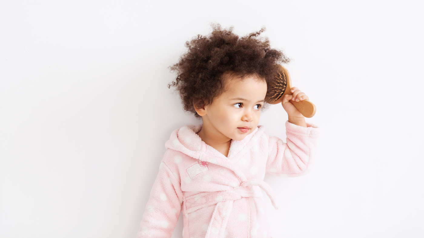 Happy hair – helping your child to care for their own hair - Featured Image