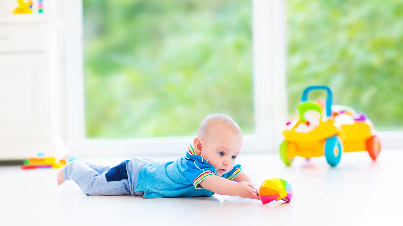 Reach out! Building on reaching skills during tummy time - Featured Image