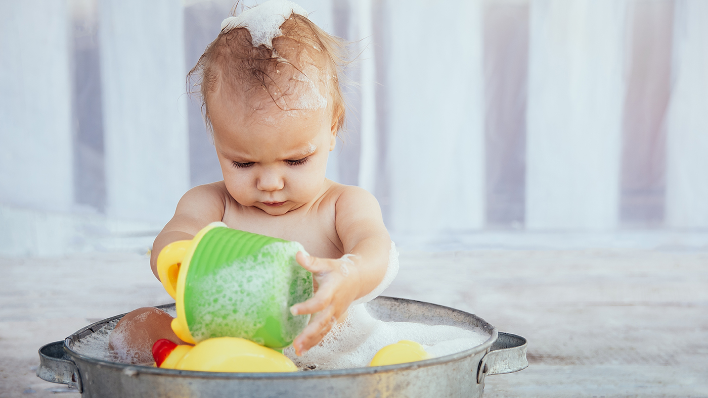 Curiosity cups – making a pouring game for your baby - Featured Image