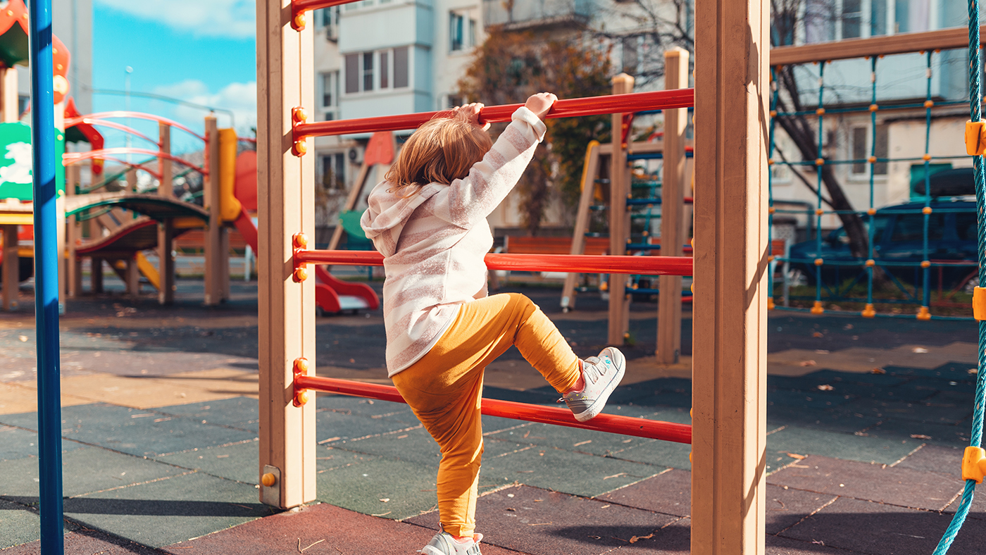 Can confidently climb up a small ladder at a playground - Featured Image