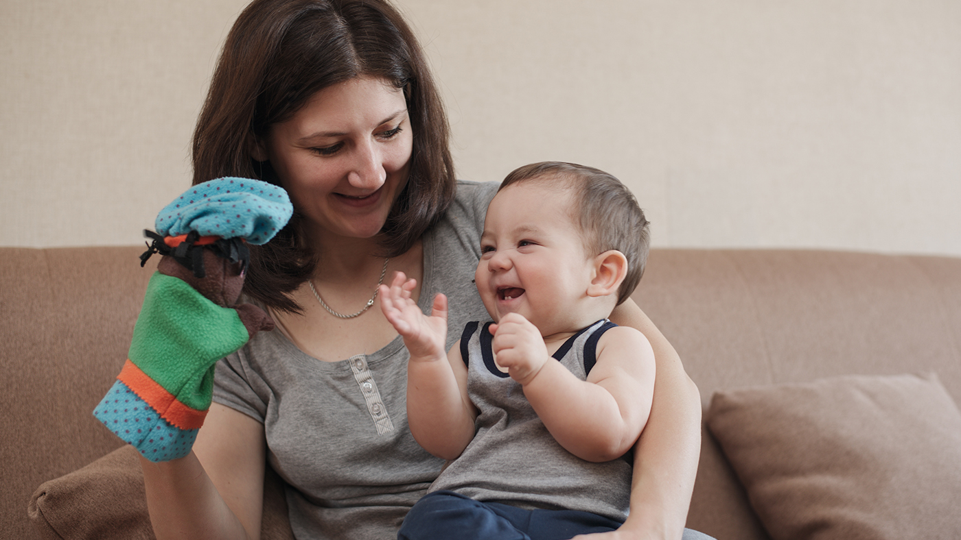 That’s the way to do it! Use a puppet to gain your toddler’s attention - Featured Image