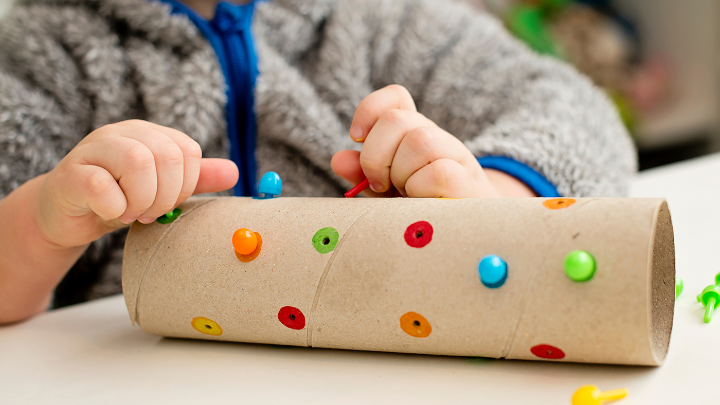 Pull and push sensory tubes – create a simple activity using three items - Featured Image