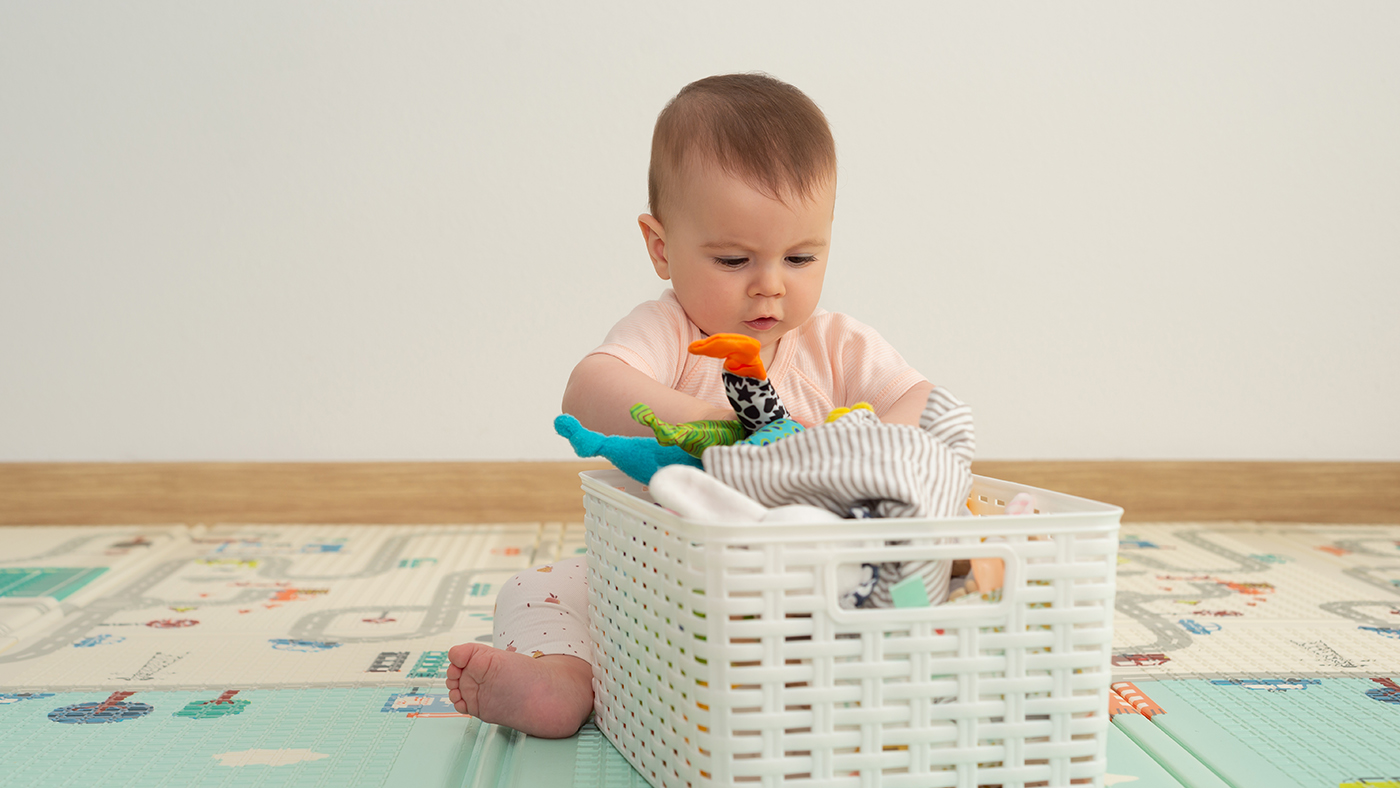 Tidying together – involving your baby when you put toys away - Featured Image