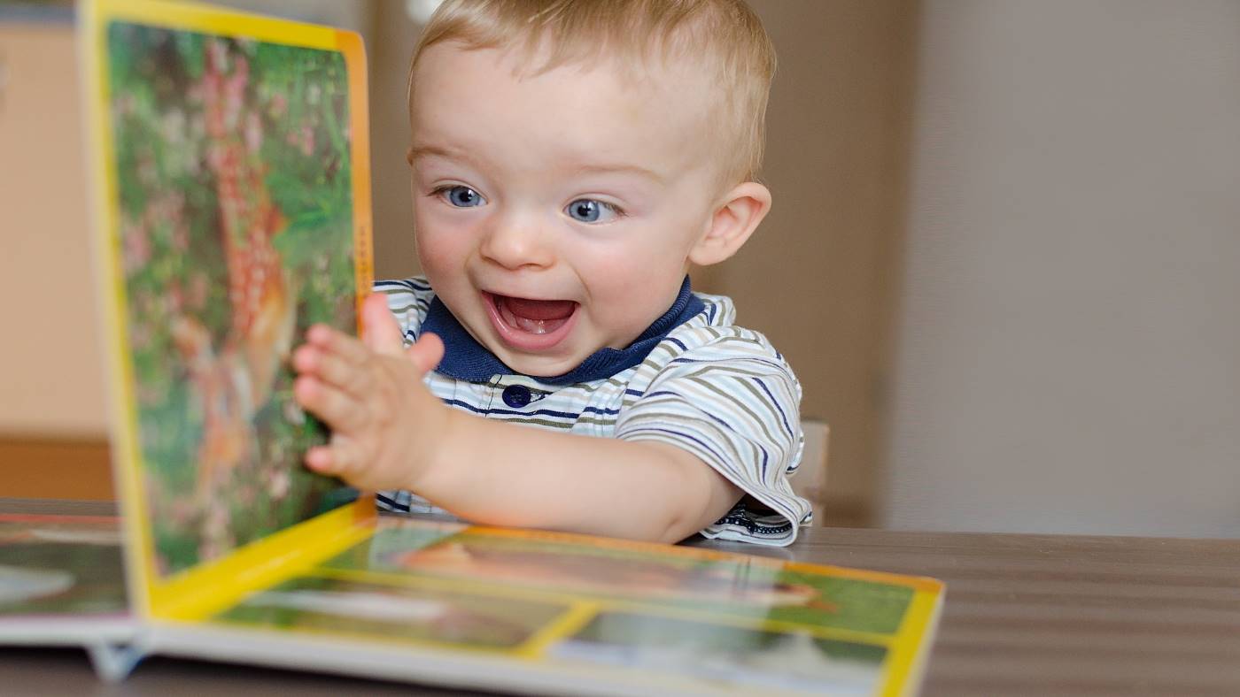 What a page turner! Your baby is showing you some incredible skills - Featured Image